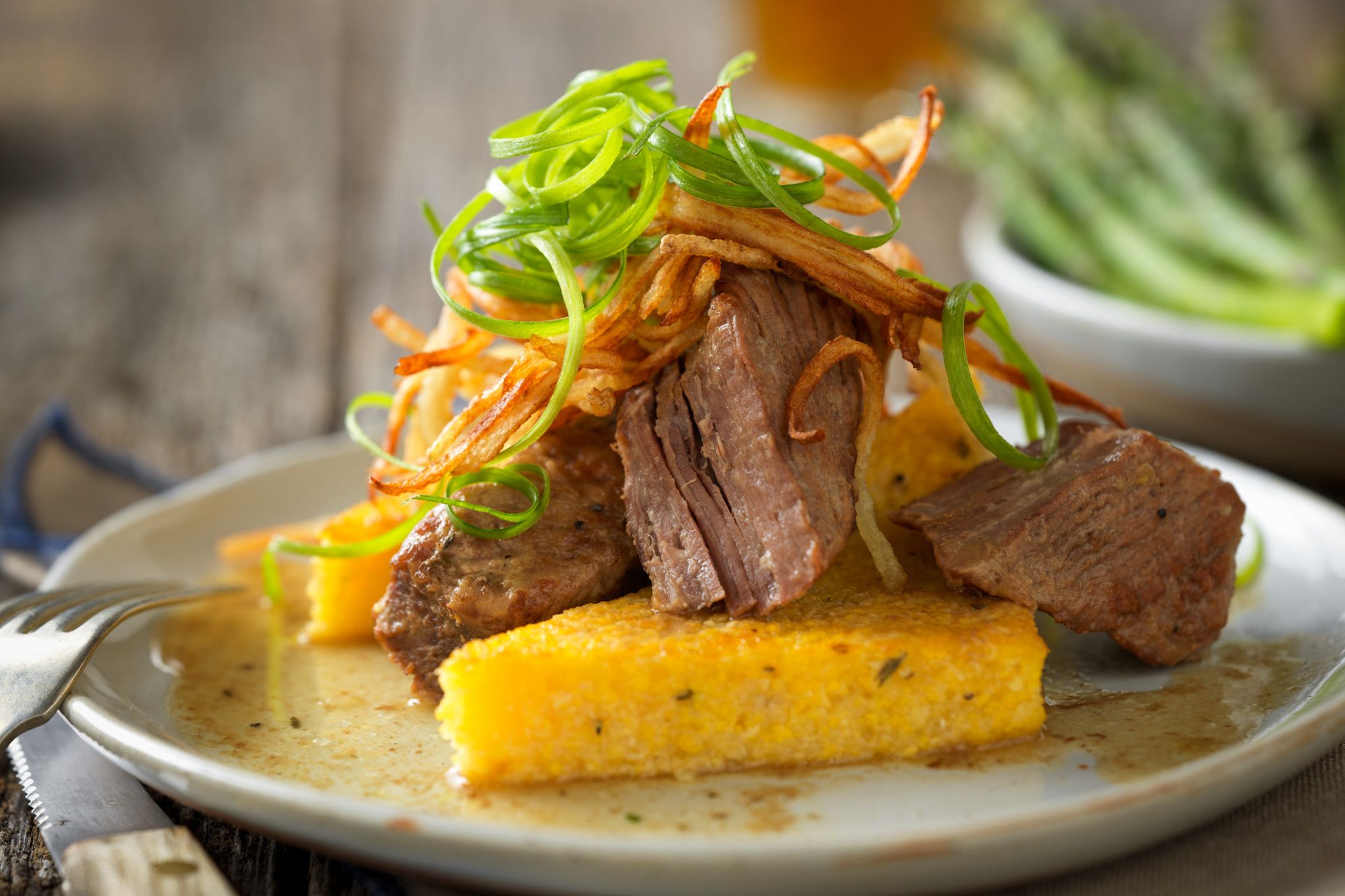 Slow-Cooked Red Wine Braised Beef Short Ribs with Herbed Polenta Toast