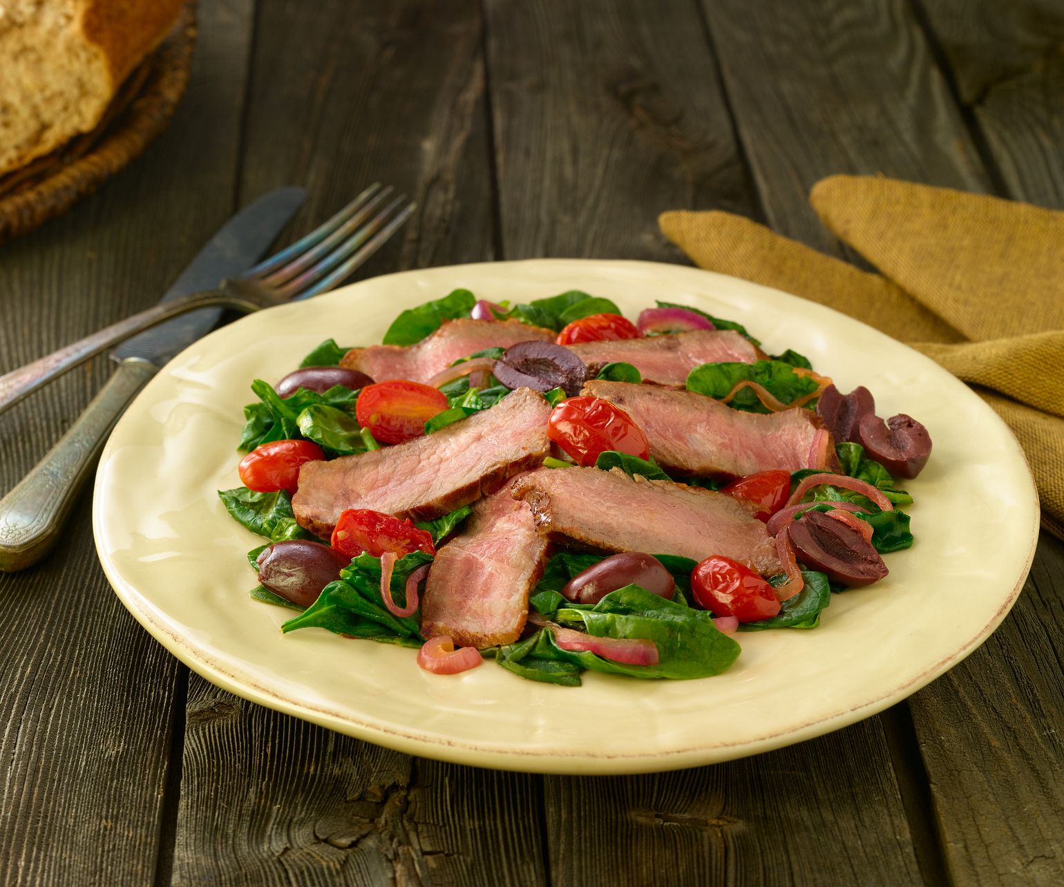 Garlic Steak with Warm Spinach