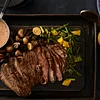 Six-Chile Beef Flank Steak with Southwest Tomato Cream and Roasted Vegetables