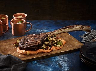 Tomahawk Steak with Grilled Brussels Sprouts and Sweet Potato Puree