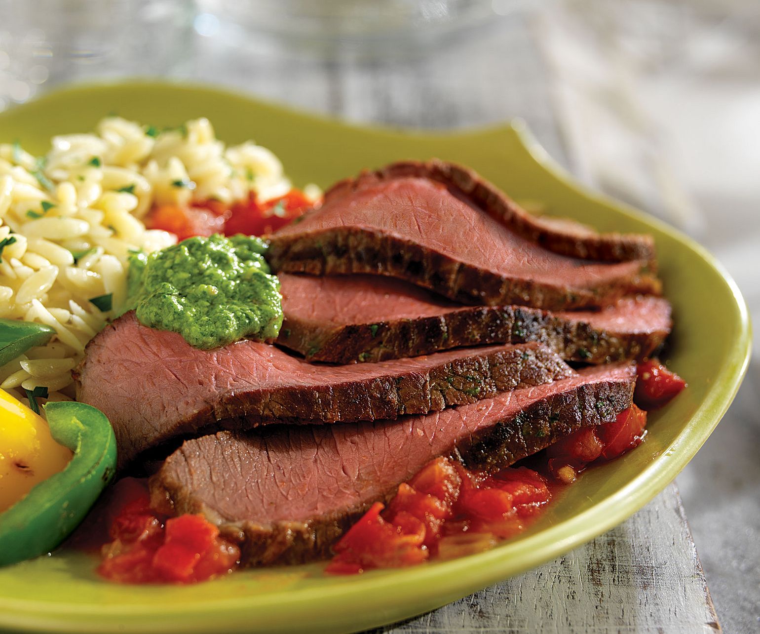 Grilled Steak with Arugula Pesto and Vodka-Tomato Sauce