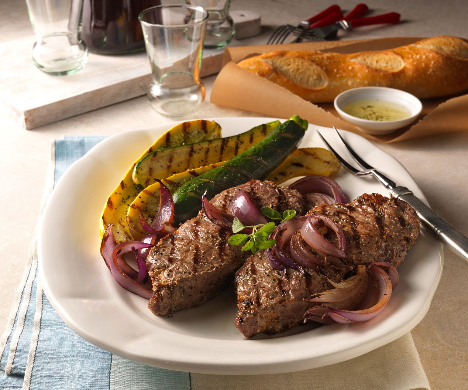 Beef Strip Steaks with Grilled Onion Relish