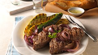Beef Strip Steaks with Grilled Onion Relish