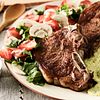 Beef Strip Steaks with Kale Polenta and Mushroom-Strawberry Salad