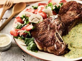 Beef Strip Steaks with Kale Polenta and Mushroom-Strawberry Salad