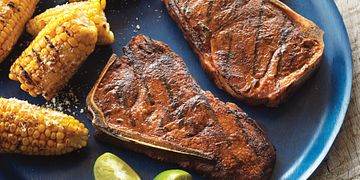 Smoky Grilled Strip Steaks with Mexican-Style Corn