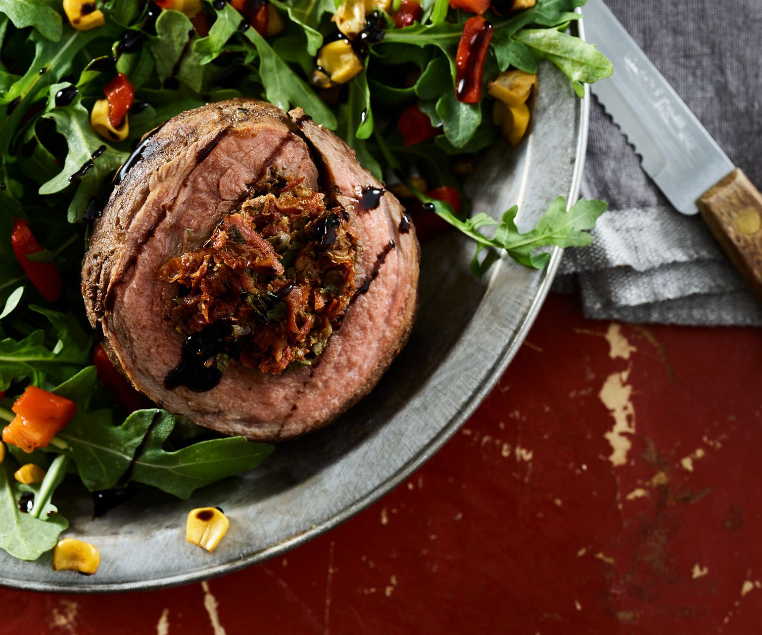 Grilled Beef Flank Pinwheels on Rocket Salad