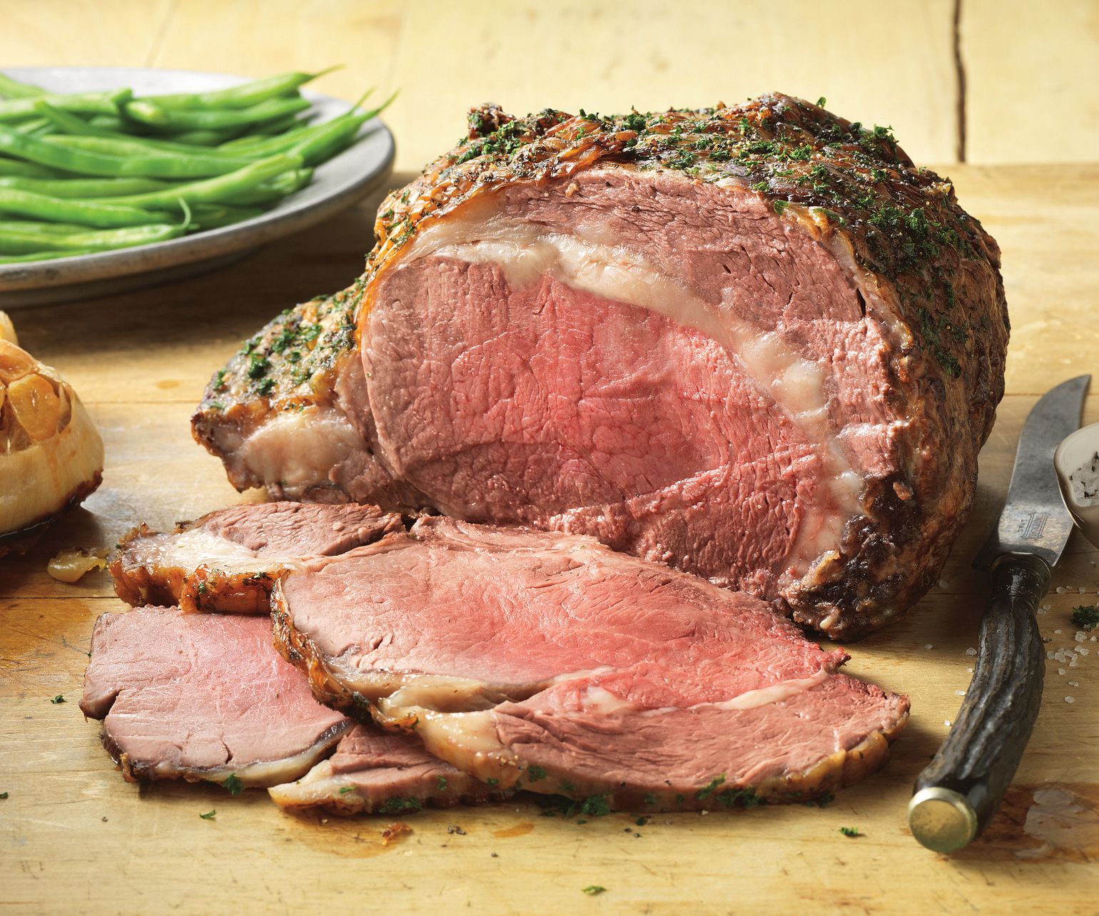 Peppered Rib Roast with Roasted Garlic Sauce