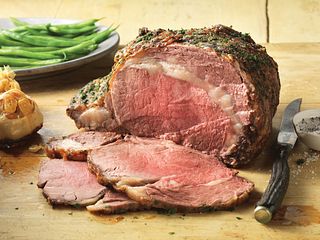 Peppered Rib Roast with Roasted Garlic Sauce