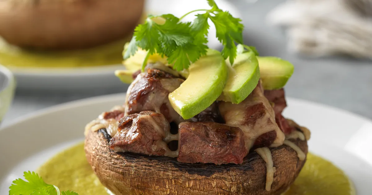 Steak-Stuffed Portobello with Creamy Poblano Sauce | Beef Loving Texans | Beef Loving Texans is your