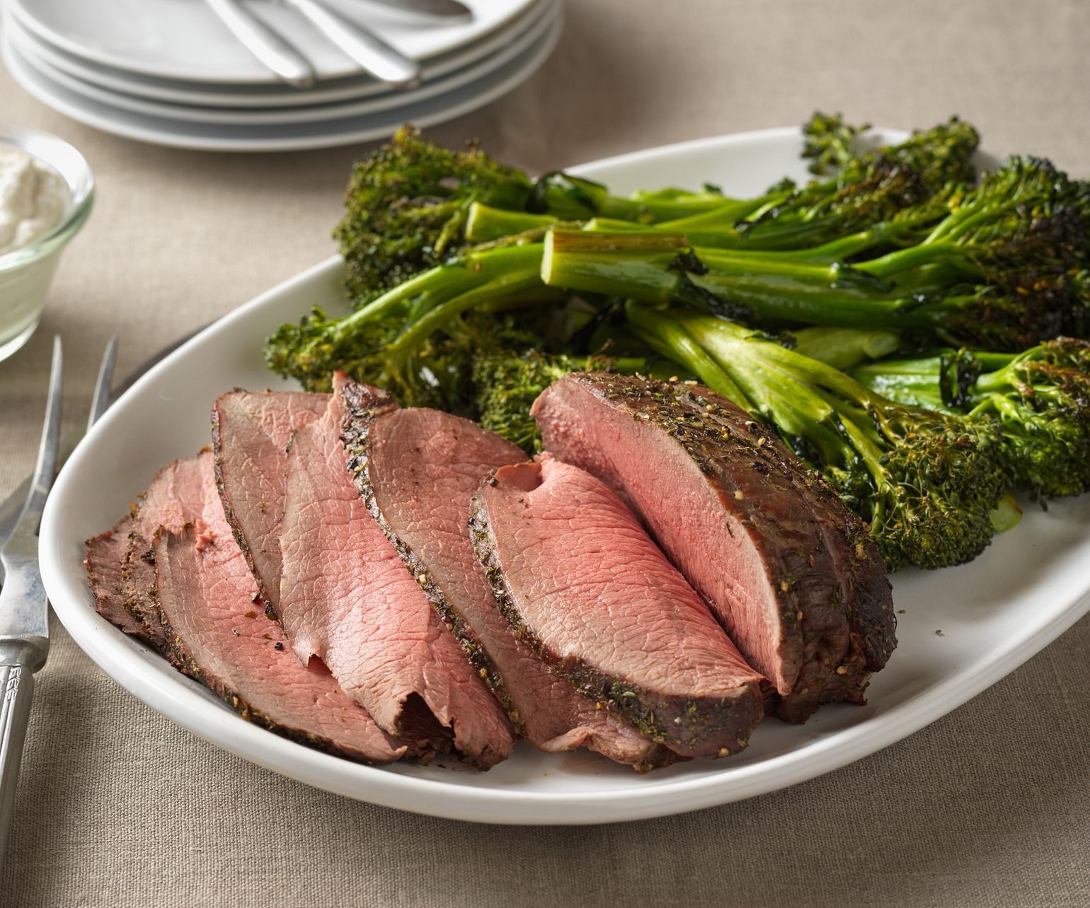 Herb-Crusted Sirloin Tip Roast with Creamy Horseradish-Chive Sauce