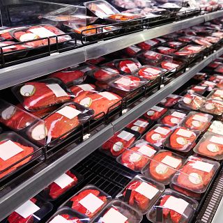 Shelves with fresh meat in supermarket