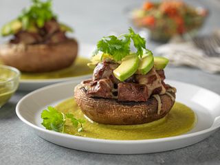 Steak-Stuffed Portobello with Creamy Poblano Sauce