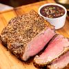 Green Peppercorn Crusted Strip Roast with Red Wine Sauce