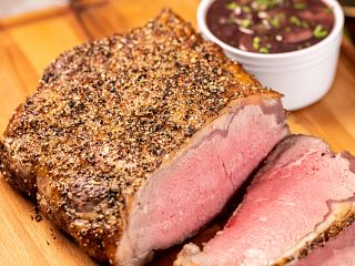 Green Peppercorn Crusted Strip Roast with Red Wine Sauce