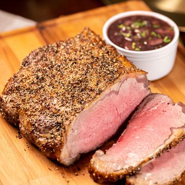 Green Peppercorn Crusted Strip Roast with Red Wine Sauce