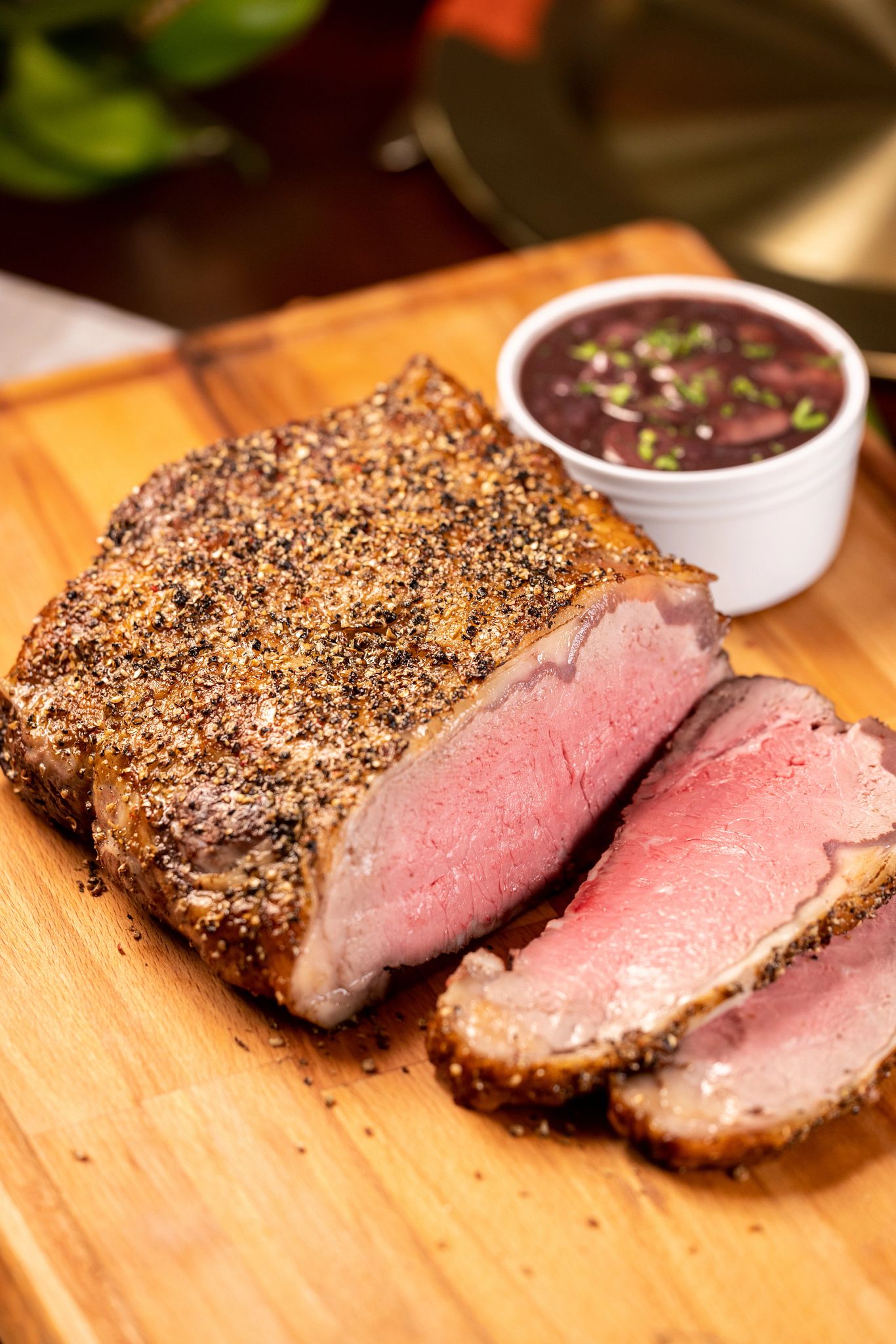 Green Peppercorn Crusted Strip Roast with Red Wine Sauce