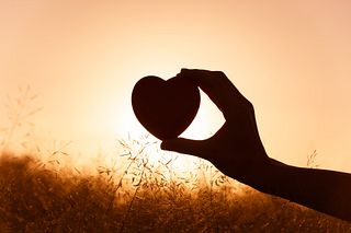 Hand holding heart