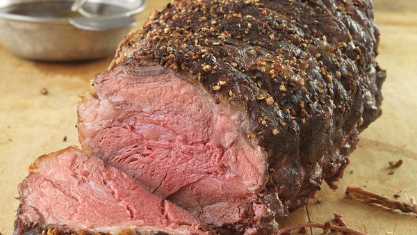 garlic-and-tri-pepper-crusted-beef-roast-with-balsamic-sauce-slice-out-horizontal