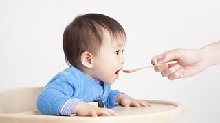 Baby Eating with Spoon