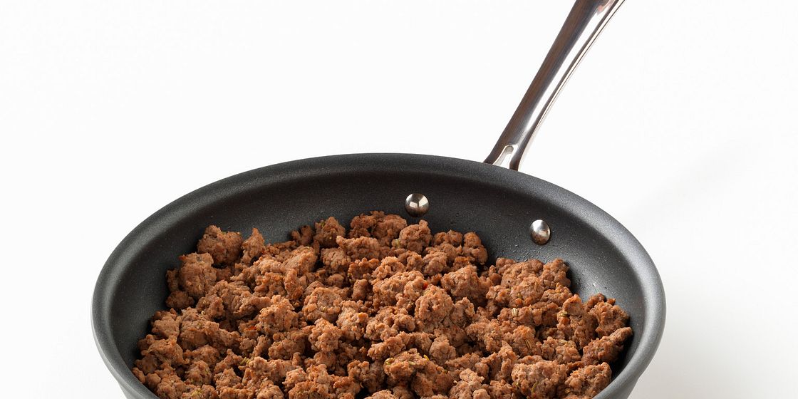 Use Your Potato Masher To Break Up Ground Meat in the Skillet