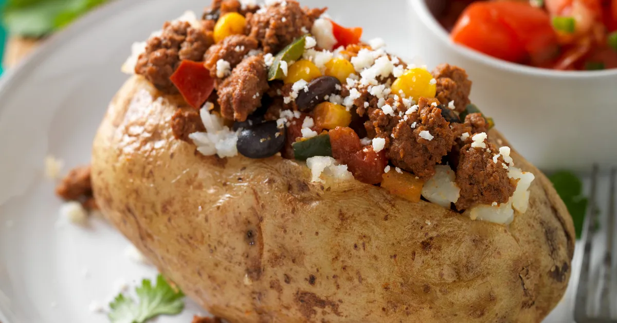Mexican-Style Beef Sausage Baked Potatoes | Beef Loving Texans | Beef Loving Texans is your one-stop