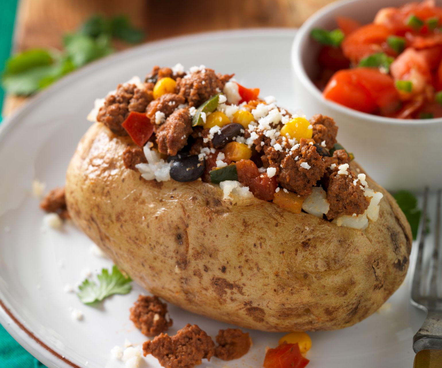 Mexican-Style Beef Sausage Baked Potatoes