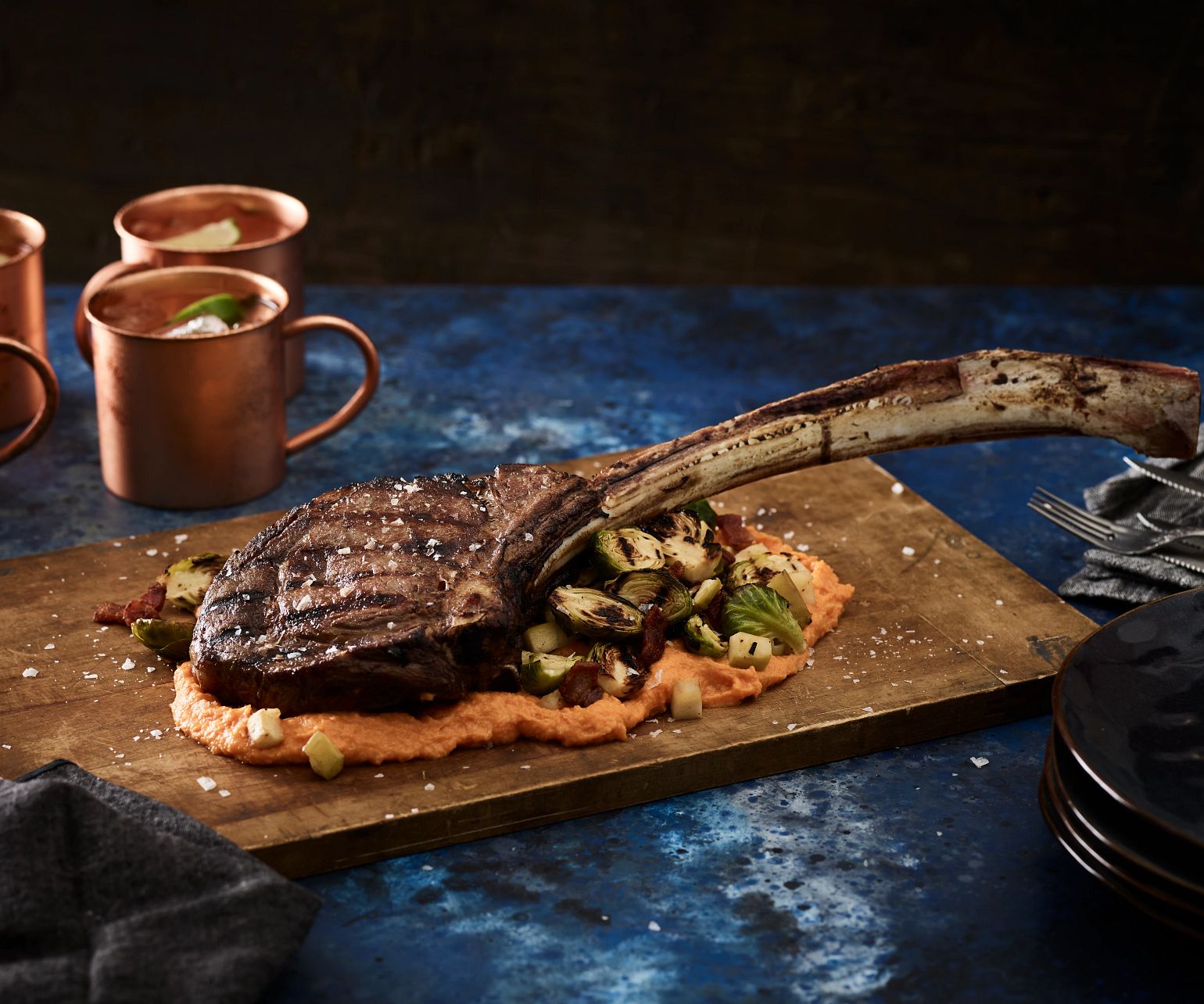 Tomahawk Steak with Grilled Brussels Sprouts and Sweet Potato Purée