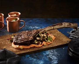 Tomahawk Steak with Grilled Brussels Sprouts and Sweet Potato Purée