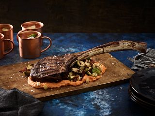 Tomahawk Steak with Grilled Brussels Sprouts and Sweet Potato Purée