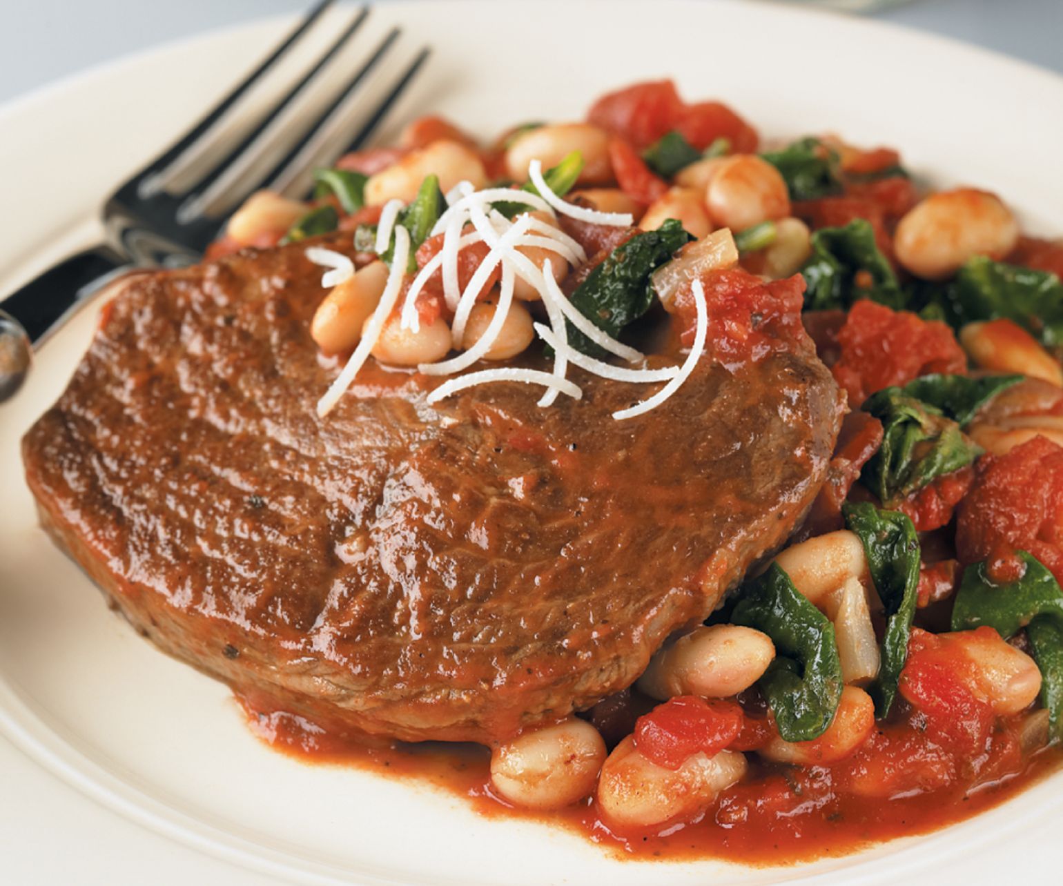 Braised Beef with Tomato-Garlic White Beans