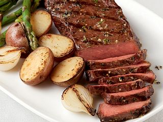 Tender Pepper-Rubbed Strip Steaks with Grilled Vegetable Trio