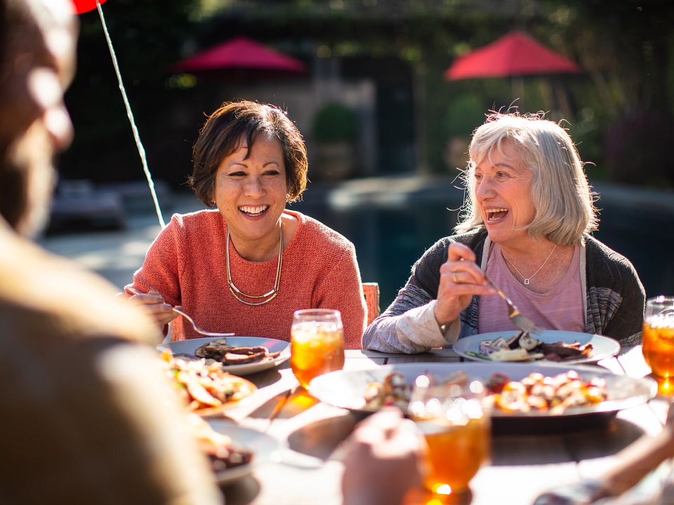 Two Ladies eating beef