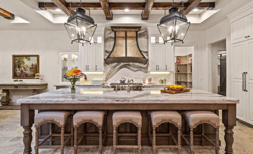 Statement-making Cambria Skara Brae™ quartz backsplash and countertops.