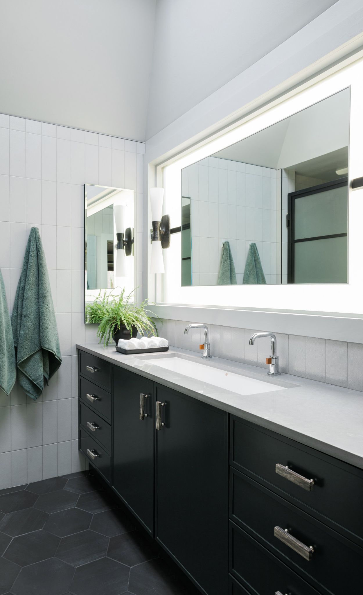 Create a masculine master bath wit Cambria Carrick and gray tones.