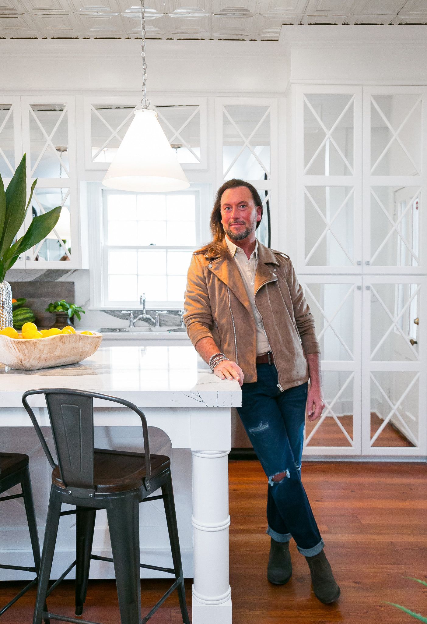 Designer T Phillips in Cambria Skara Brae kitchen.