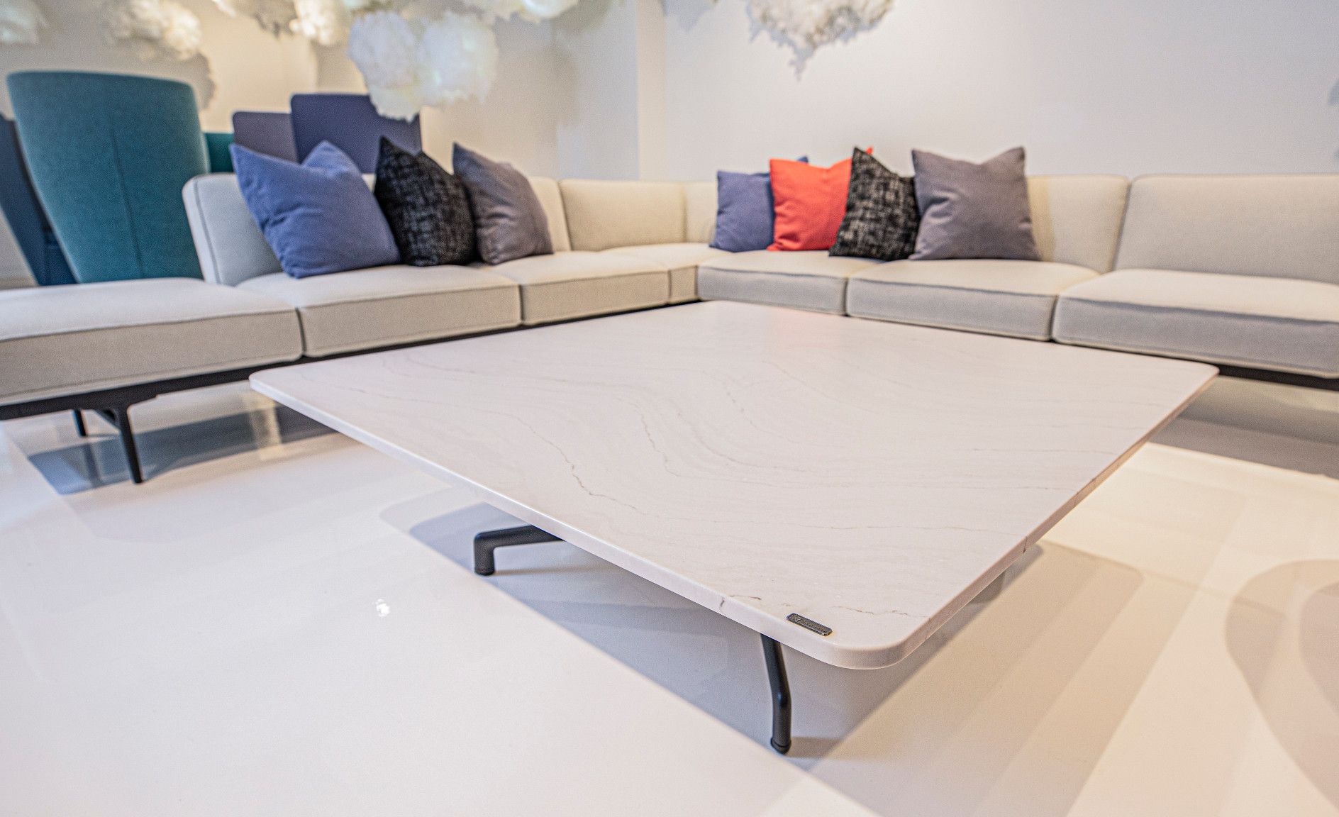 Cambria Ella adds texture to this bright white waiting room.