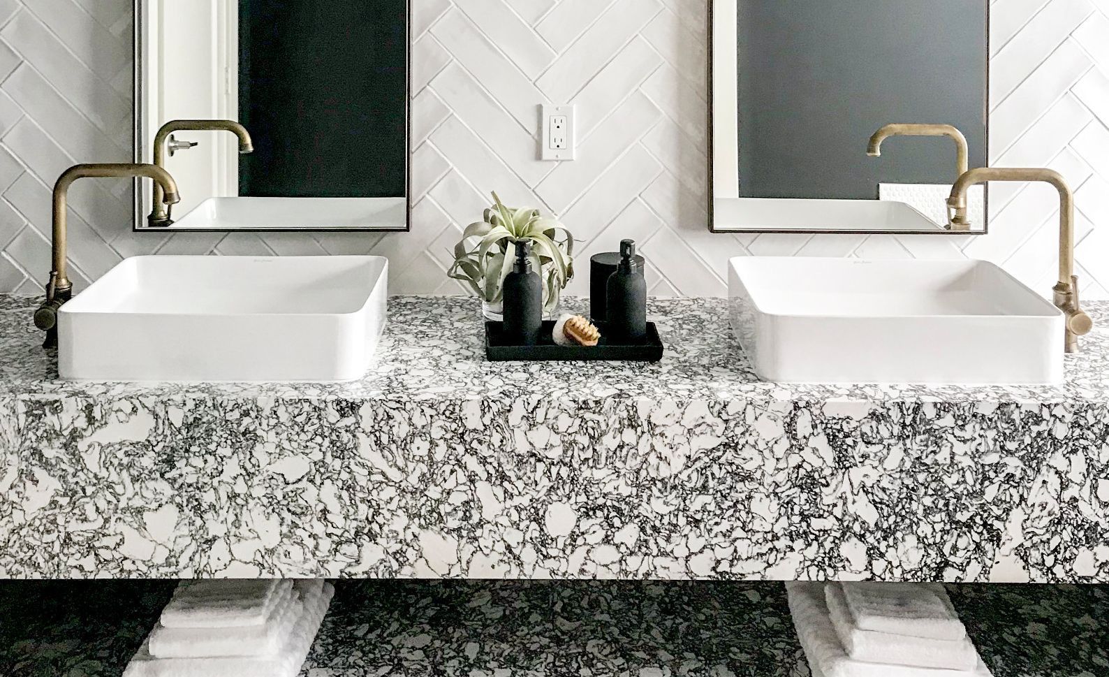 High-contrast black and white floating vanity in Cambria Rose Bay.