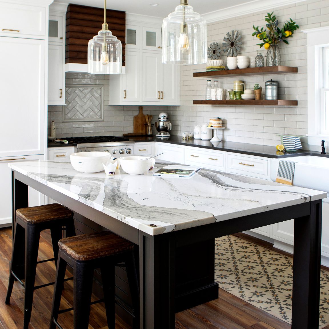 Cambria Skara Brae countertops on a dark brown kitchen island.