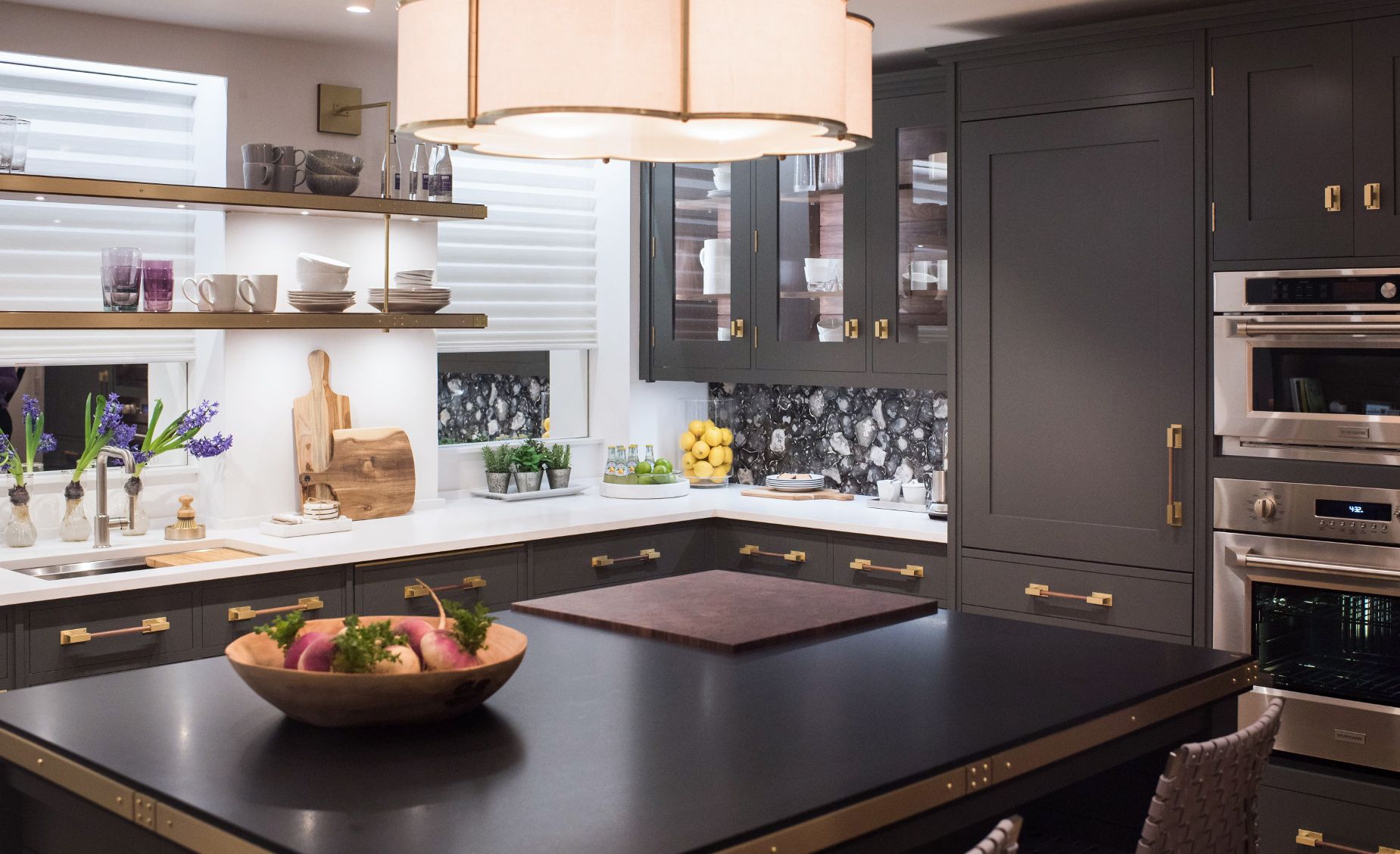 Cambria Blackpool Matte countertops create a darker kitchen palette with Cambria White Cliff Matte on the perimeter.