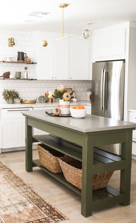 Green farmhouse table paired with Cambria Carrick.