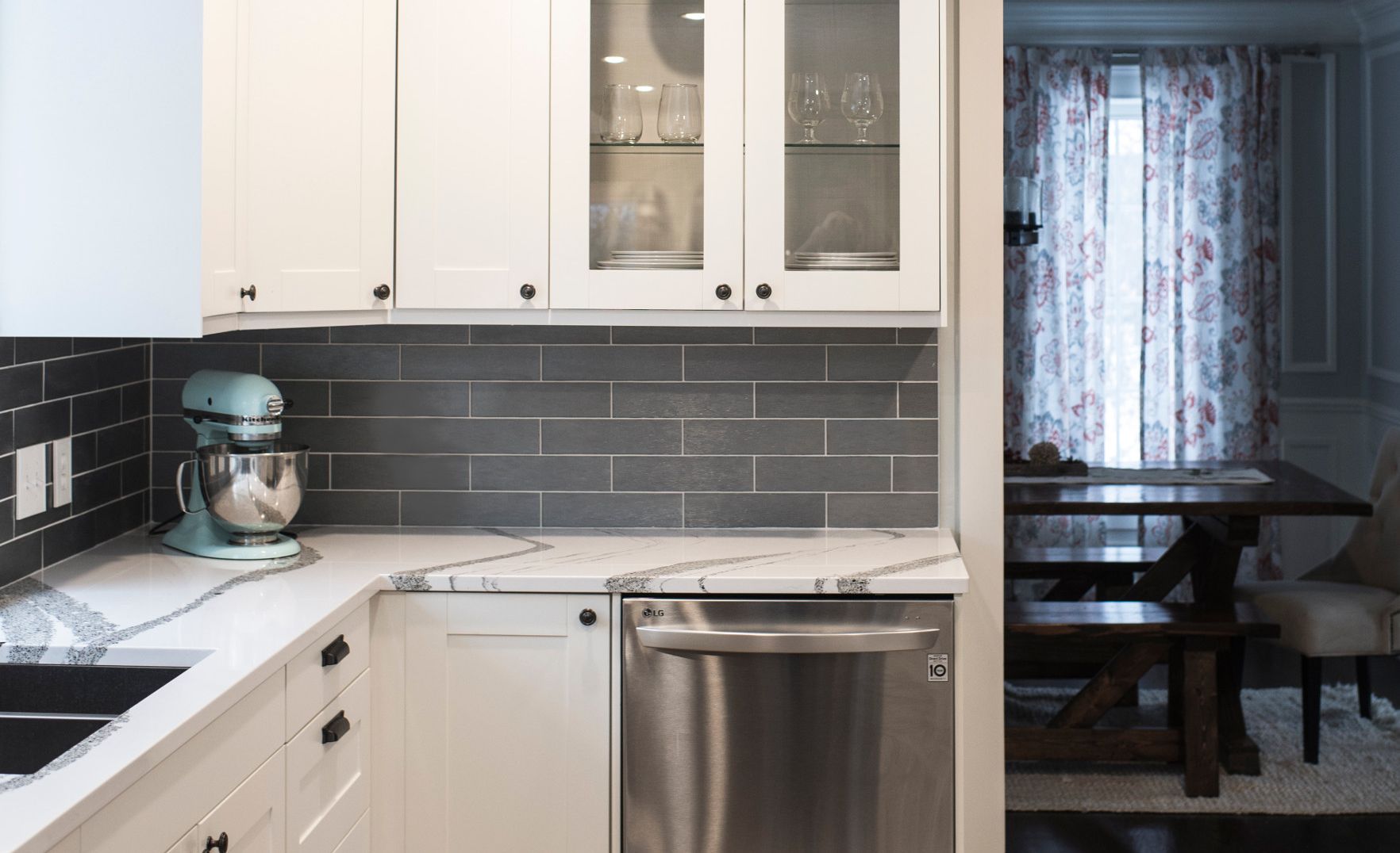 Cambria Annicca paired with gray subway tile.