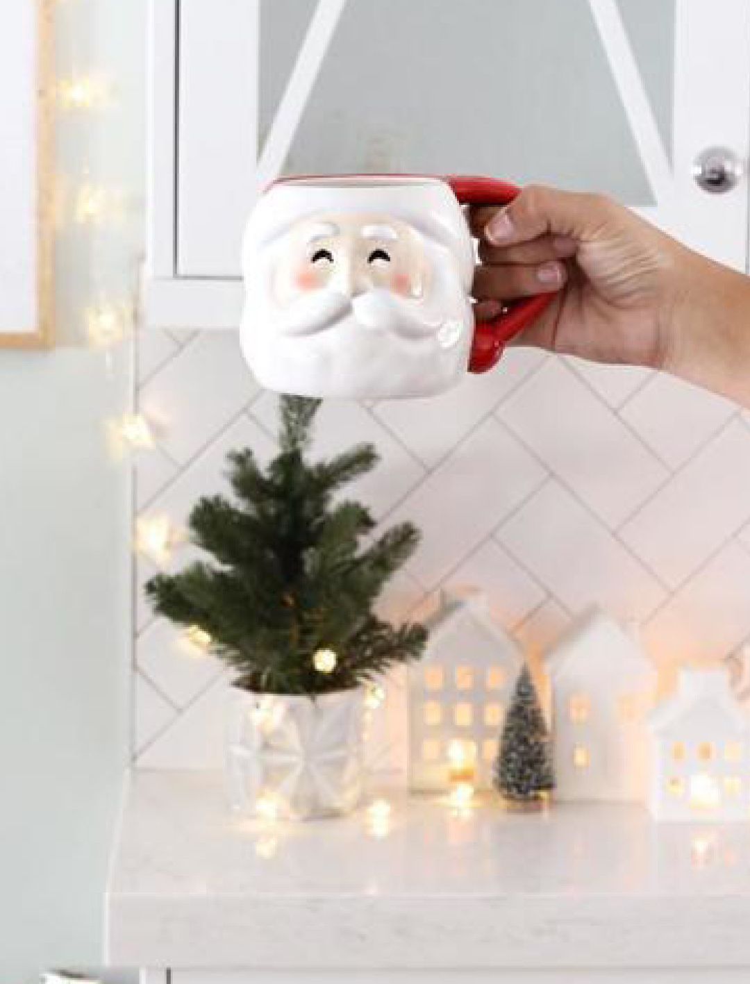 Have a cup of cheer with seasonal Santa mugs. F