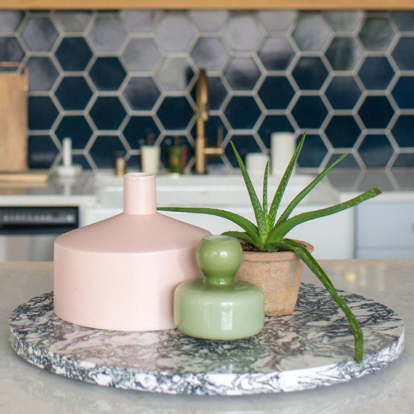 Cambria lazy Susan being used as kitchen decor.