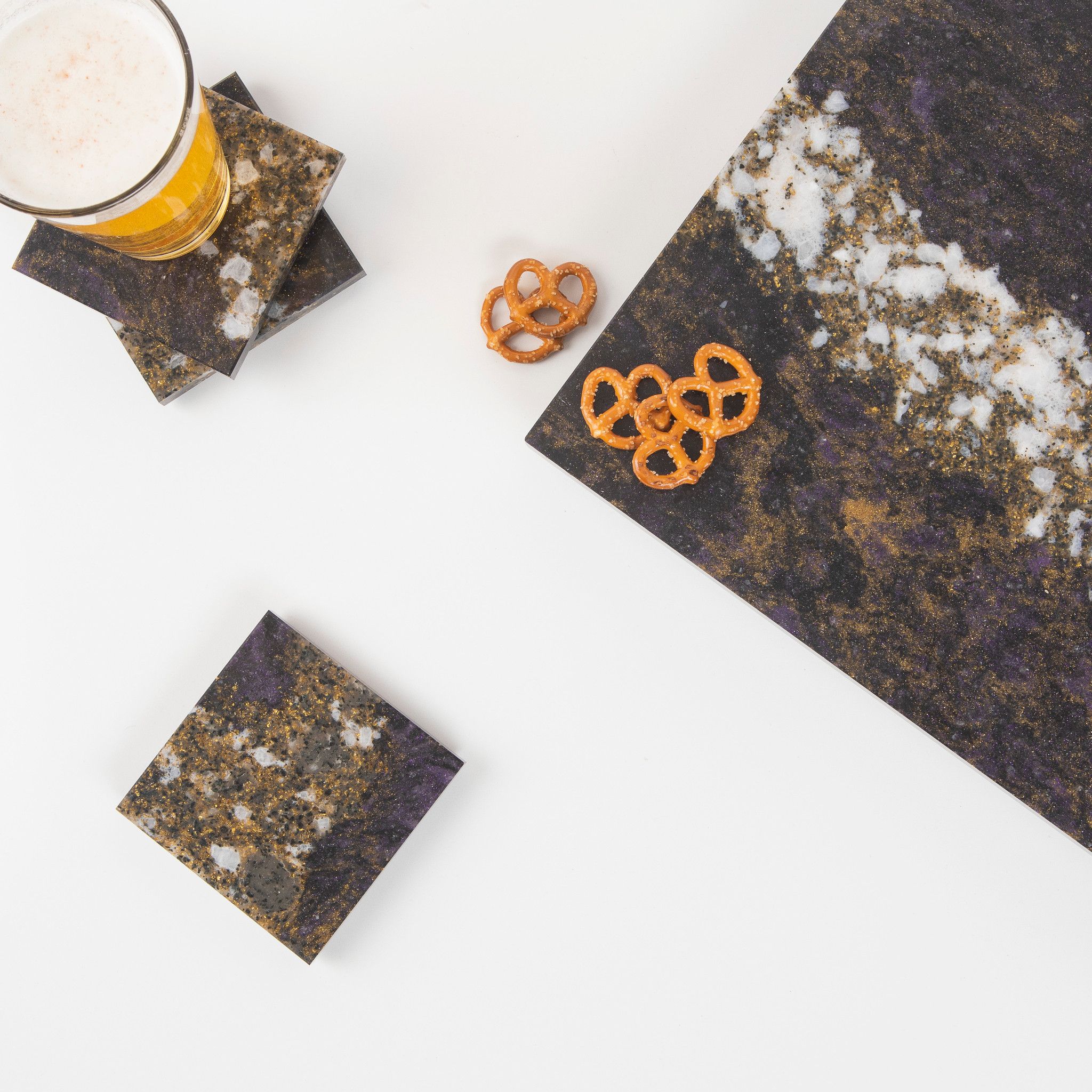 Cambria cheeseboard and coasters in Princetown design.