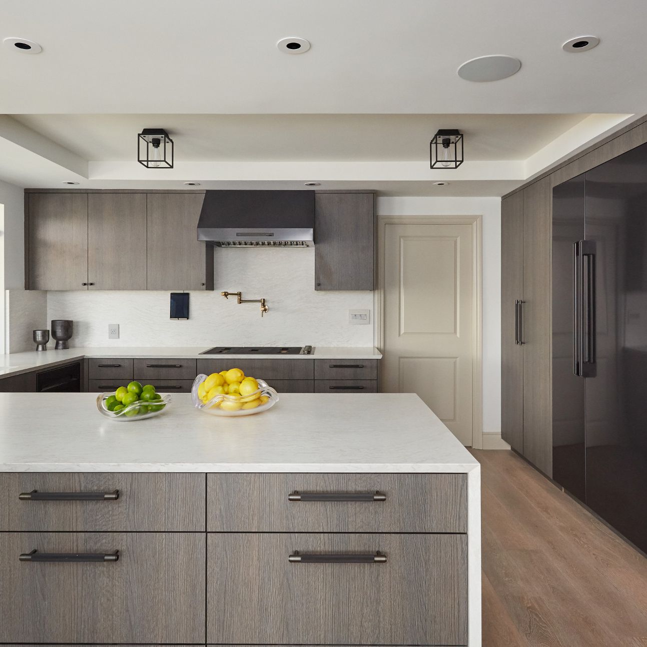A kitchen with a stove top oven
Description automatically generated