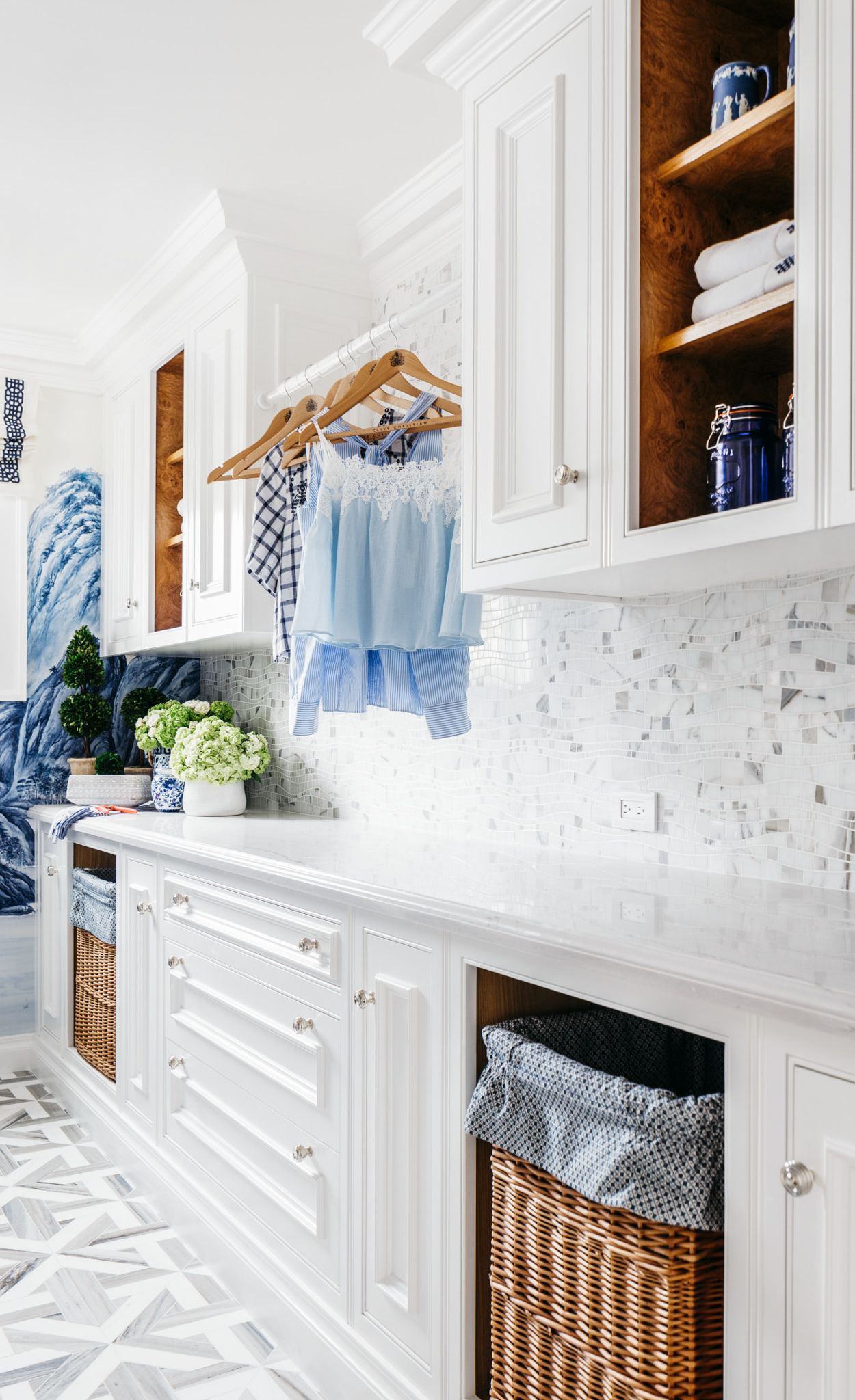 Cambria Ella countertops paired with white cabinets in a laundry room.