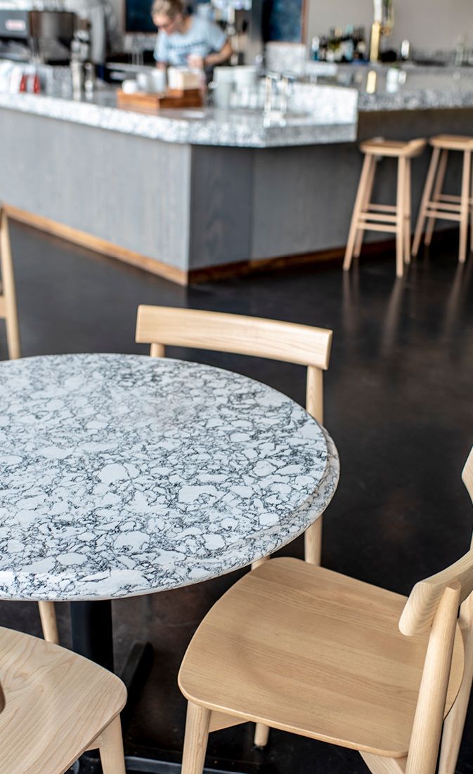 Cambria Rosedale tables complement the chic countertops.