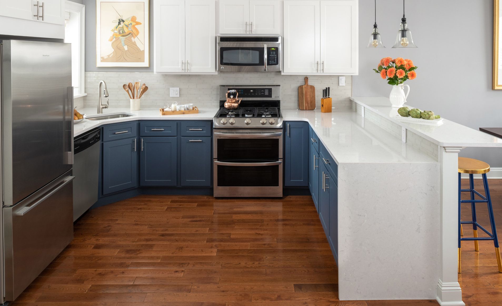 Two-tone kitchen remodel featuring Cambria Weybourne countertops.