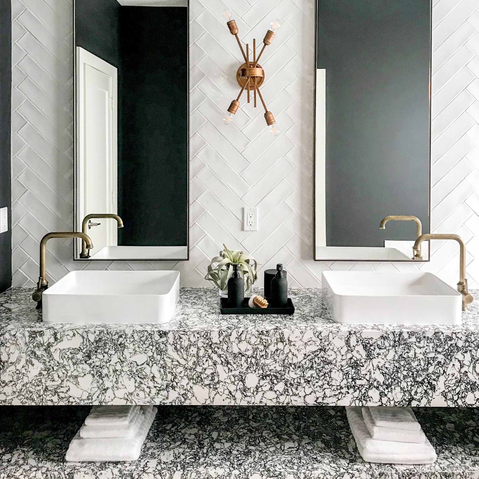 Customer floating vanity made of Cambria Rose Bay quartz.